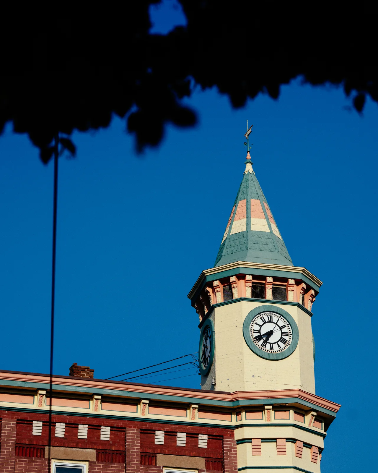 A clock tower rising into a deep blue sky in Berlin, Wisconsin