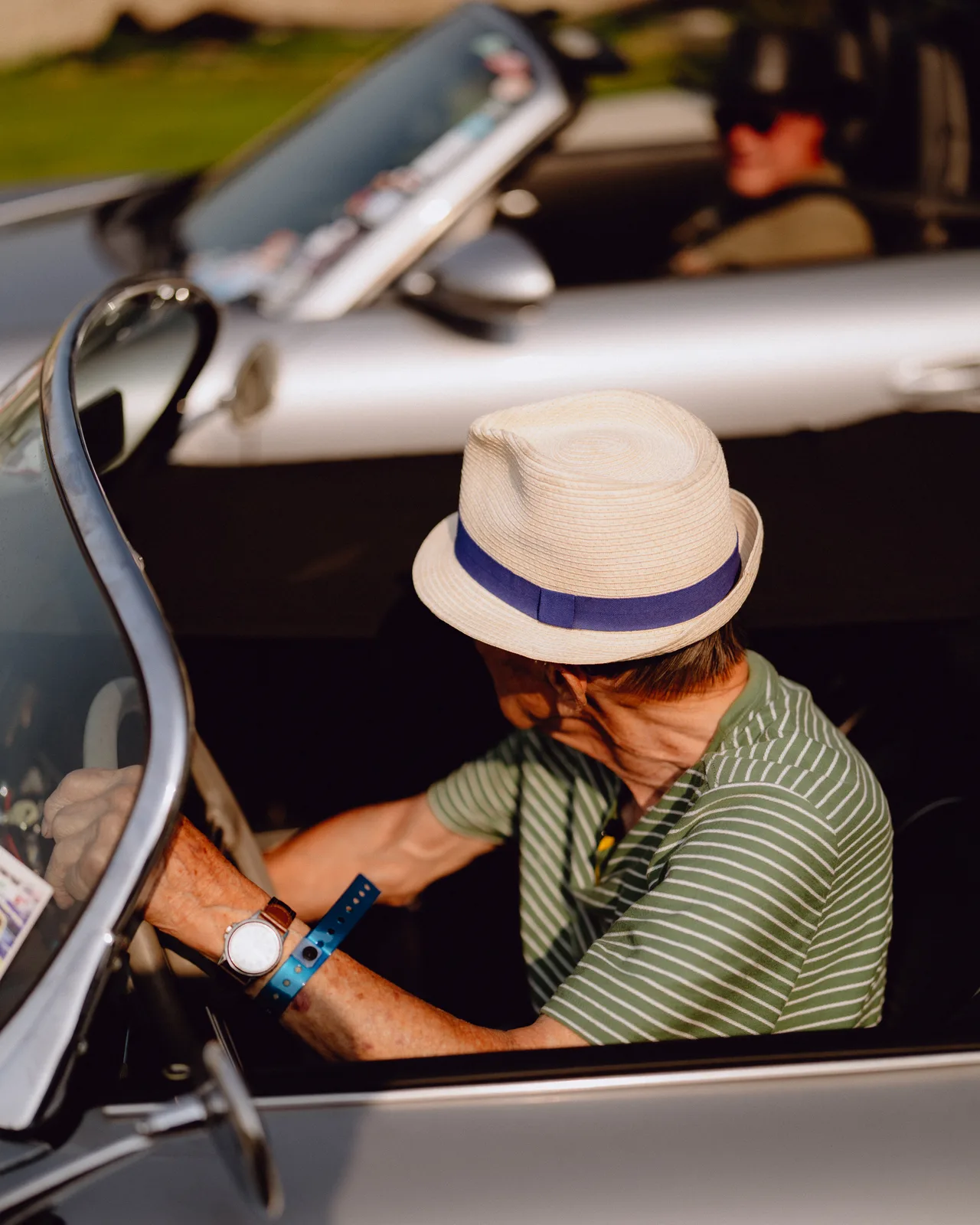 Curt Cromwell seated behind the wheel of his 1956 Porsche Speedster
