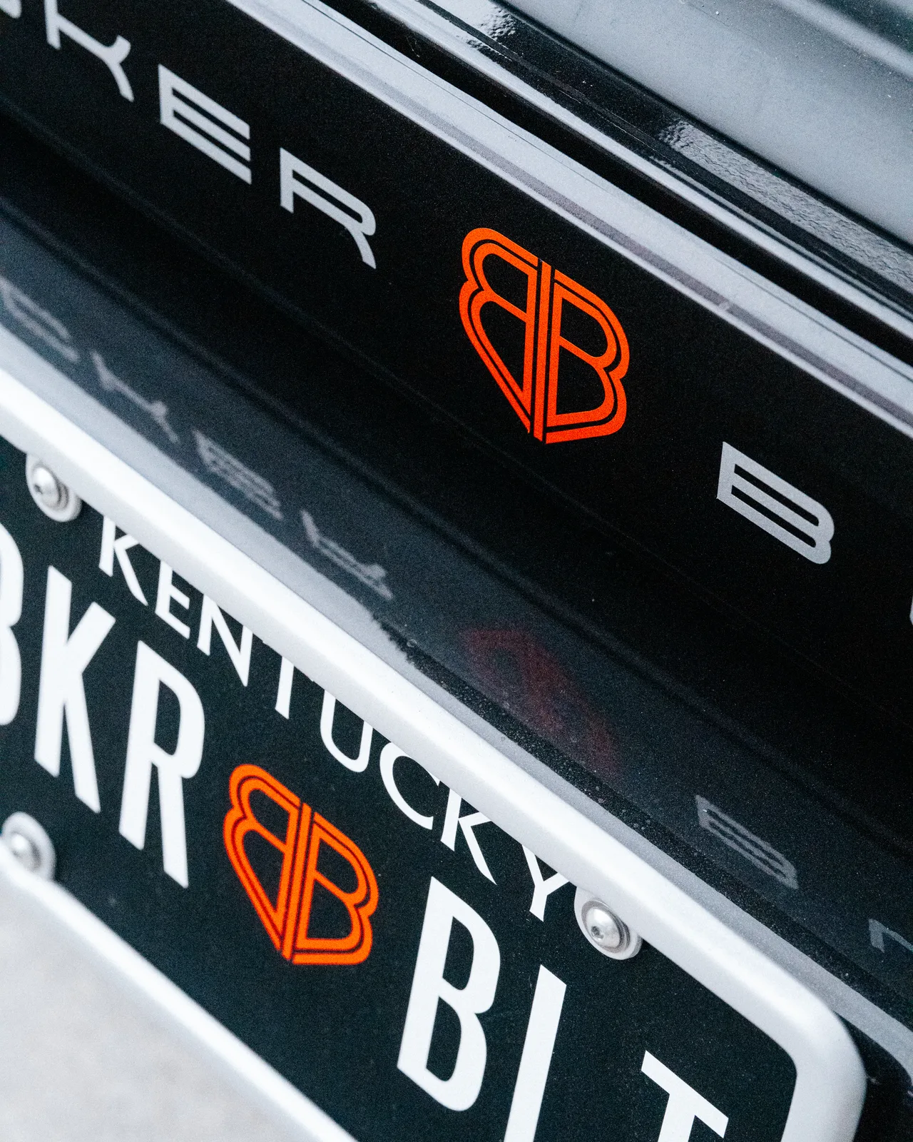 Bobby Rahal Automotive Group branding on a row of license plates